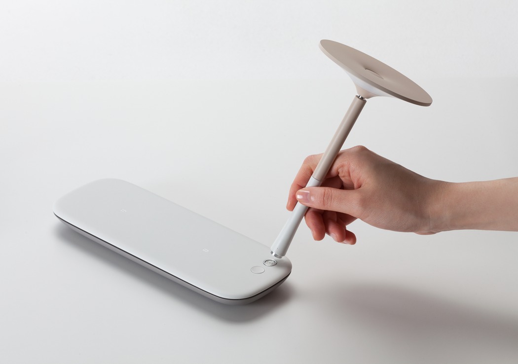This playfully unique wireless charger isn't a pad or a dock - Yanko Design