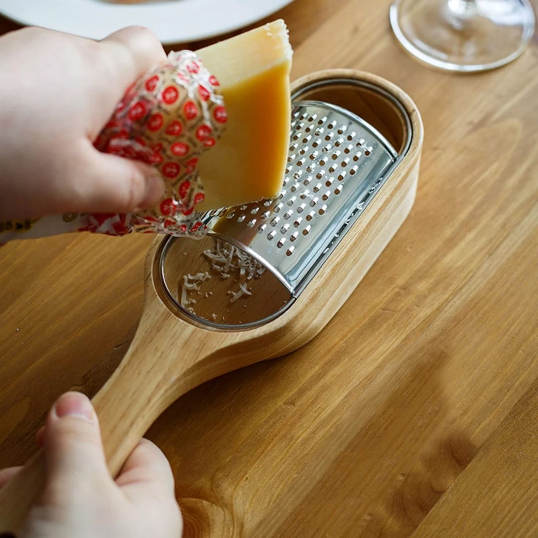 This elegant grater comes with its own wood container, and I can't