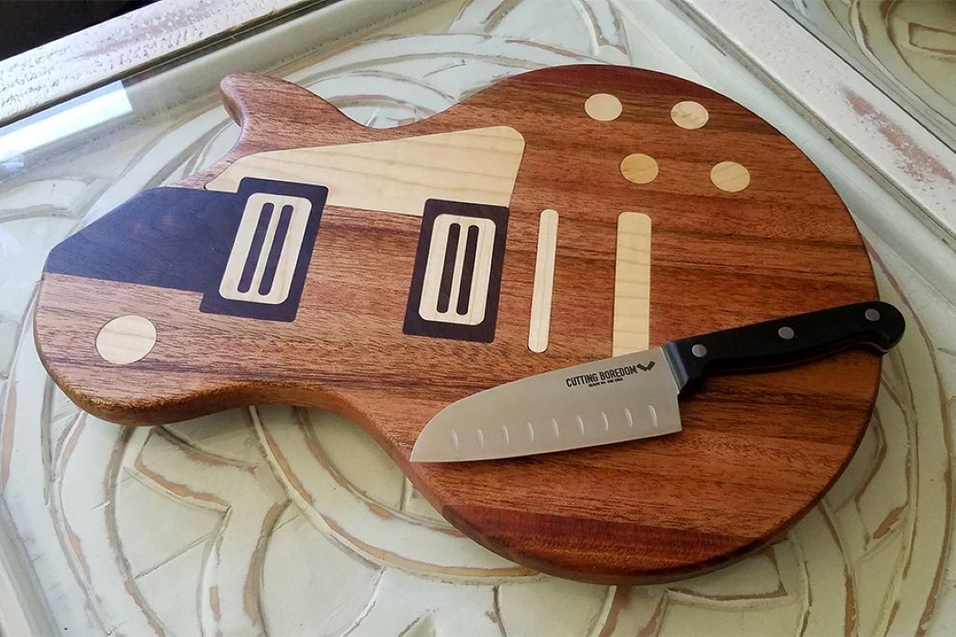 These guitar-shaped kitchen cutting boards are made for a different kind of  'shredding'! - Yanko Design