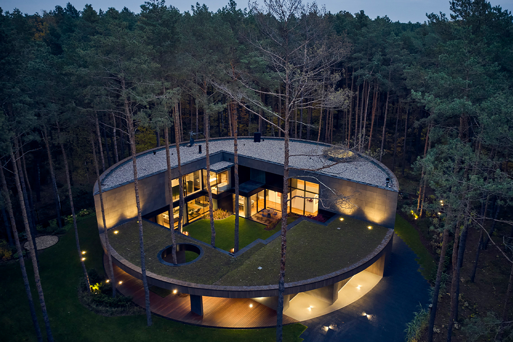 This Circular House Is Inspired By A Cut Tree Trunk Was Made To Blend Into The Surrounding