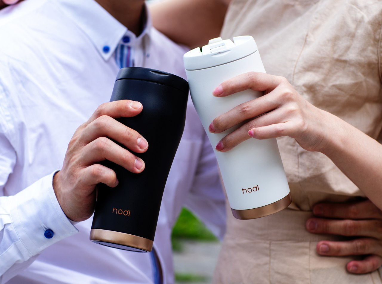 This ceramic tumbler with a removable glass cup retains your drinks ...