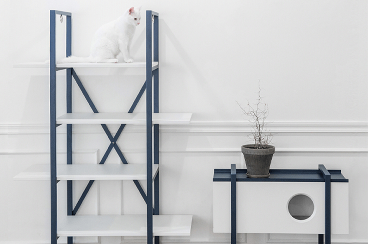 #This minimalist furniture piece for cats is a hybrid of a bookshelf and tower where cats can play and rest