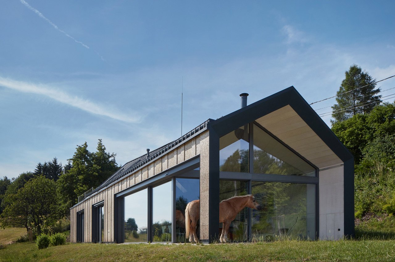 #This beautiful family home is in the Czech countryside is clad in cork