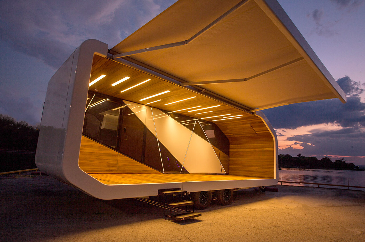 #This sleek mobile home with a folding awning can extend upto 3x its original size