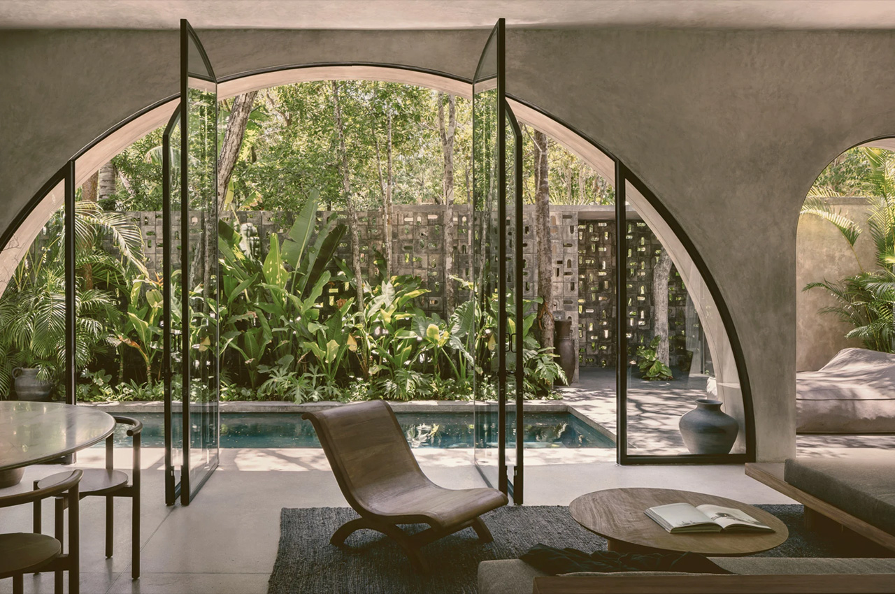 #This rustic concrete home in Tulum is nestled within a tropical garden