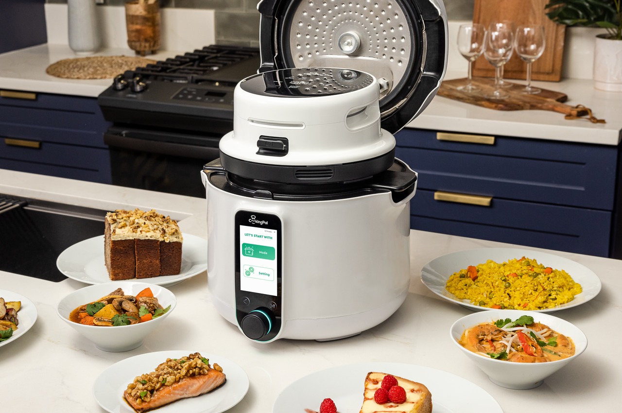https://www.yankodesign.com/images/design_news/2023/04/this-multifunctional-smart-cooker-turns-you-into-a-kitchen-wiz-with-ease/kitchen_appliance_that_is_a_pressure_cooker_saucepan_and_air-fryer_hero.jpg