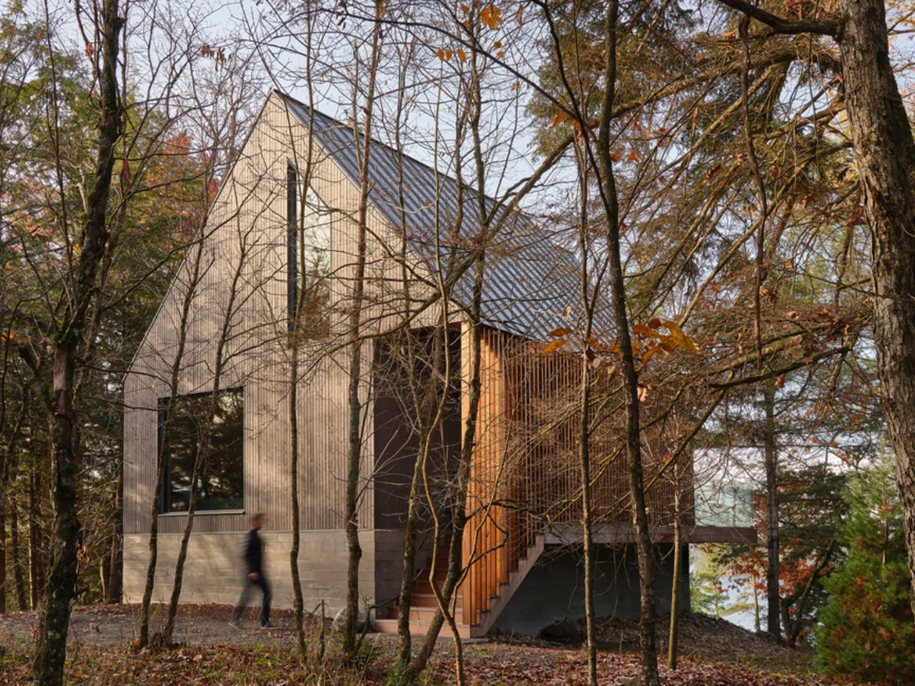 Bunkie On A Hill Is A Contemporary Reinterpretation Of A Classic A-Frame Cabin With A Vaulted Roof