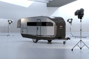 Trailer with a fish-inspired aerodynamic design showcases modular living space and inflatable construction