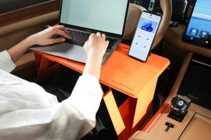 Origami-inspired foldable laptop desk also functions as a car table and food tray