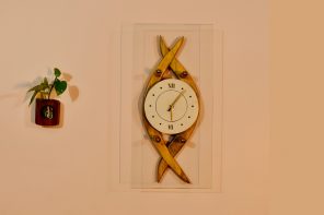 Artistic wall clock design adds a symbol-laden design object to your space