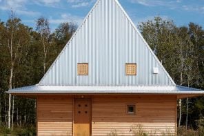 This Little Wooden Cabin On The Swedish Coast Boasts An Unusual Hat-Shaped Metal Roof