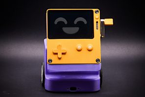 Playdate handheld console dock turns it into a cute desktop robot on wheels