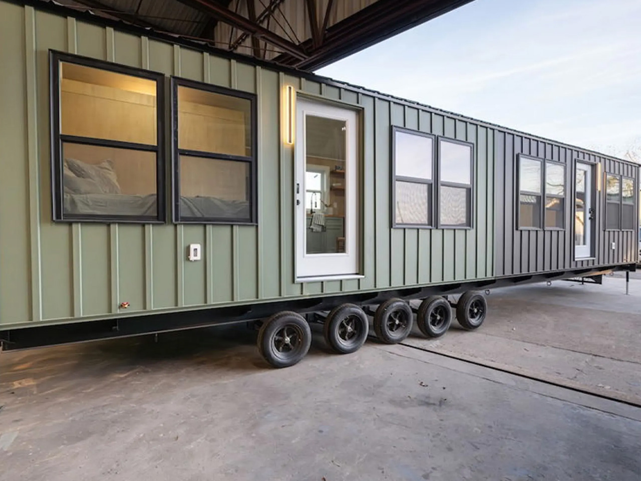 Duplex Tiny Home With Two Houses Pushes The Boundaries Of Micro-Living On A Quint-Axle Trailer